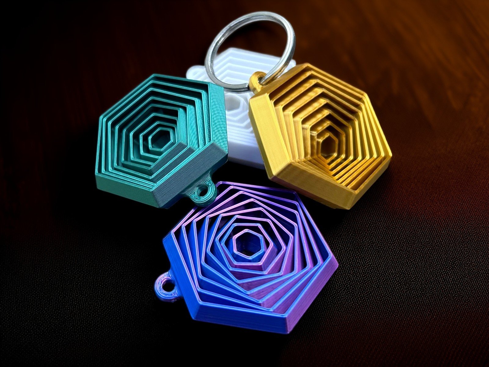 Foto da galeria do produto Chaveiro Hexagonal Geométrico 3D